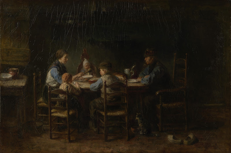 《围坐桌边的一个农民家庭》